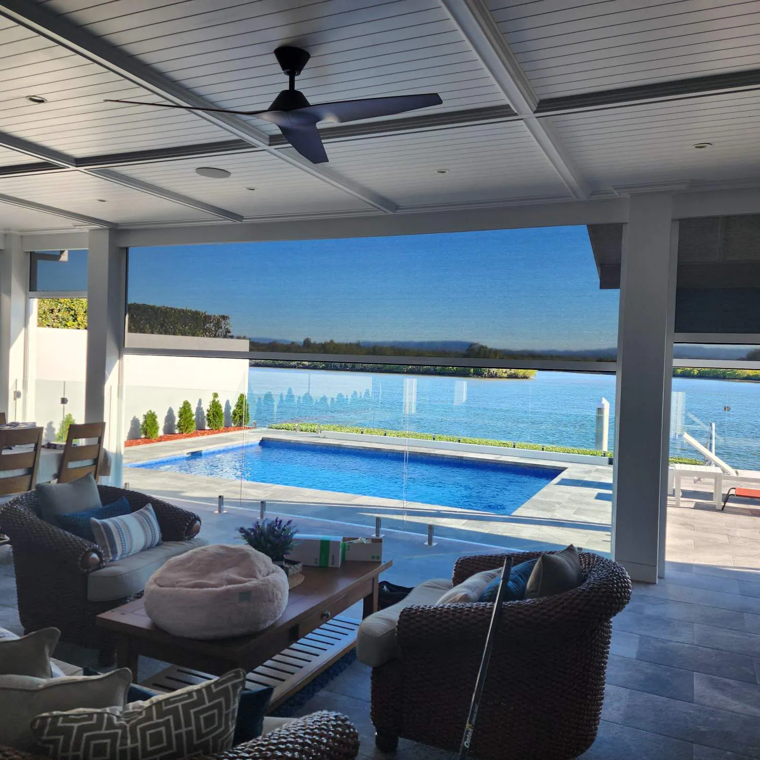 Outdoor blinds on a waterfront Gold Coast entertaining area